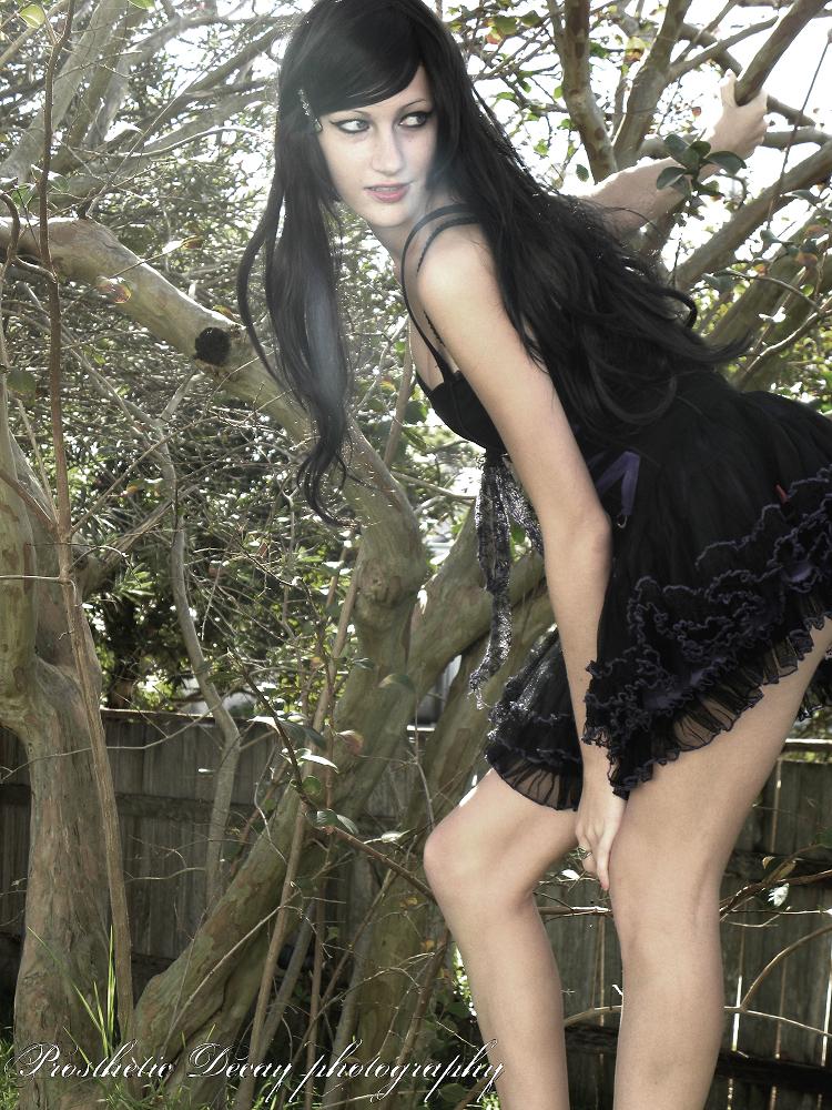 Female model photo shoot of prosthetic decay and Shani Rae