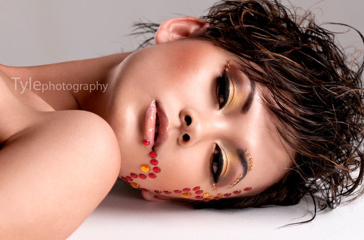 Female model photo shoot of makeupbyLan