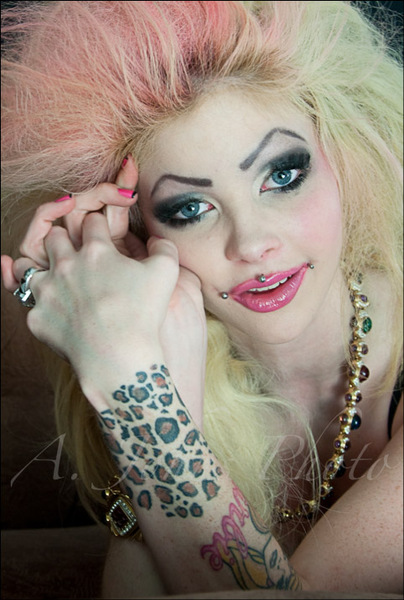 Female model photo shoot of SkinByAmanda in Make Up and hair By Amanda Miller
