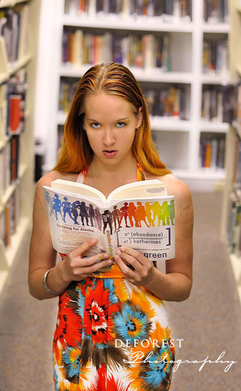 Female model photo shoot of Taryn Davis in Smiley Library, makeup by Lorinda Bluma MUA