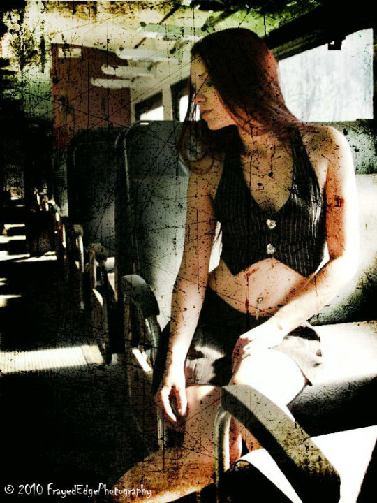 Female model photo shoot of FrayedEdgePhotography and Anne Schaar in Abandoned Train. Cleveland, OH