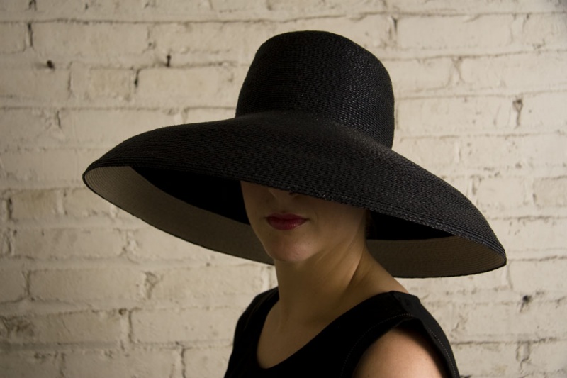 Female model photo shoot of Patricia Underwood Hats