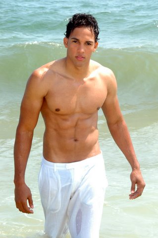Male model photo shoot of manny sanz in john beach