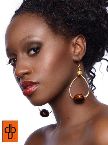 Female model photo shoot of Ghanaian Beauty