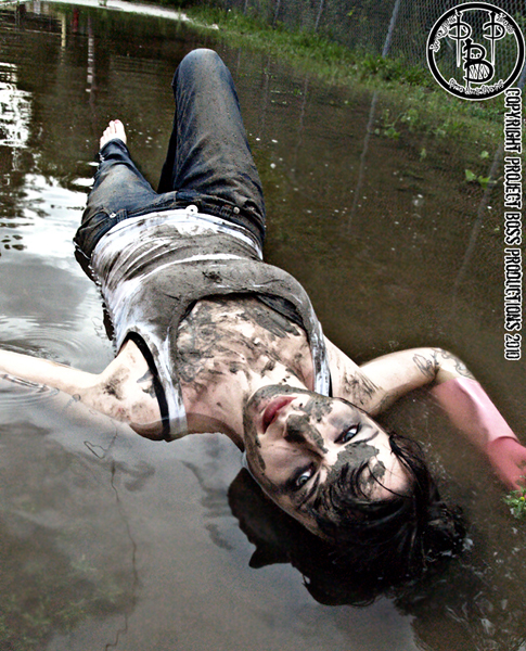 Male and Female model photo shoot of ProjectBossProductions and Mizz Gen in a puddle o water