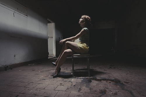 Female model photo shoot of Mekennady in Broken down building