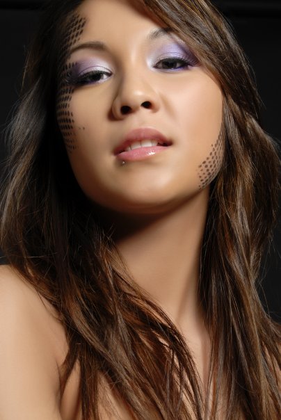 Female model photo shoot of DolledUp Makeup 
