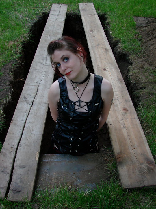 Female model photo shoot of Rose KS in A graveyard