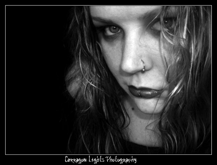 Female model photo shoot of Curragon Lights