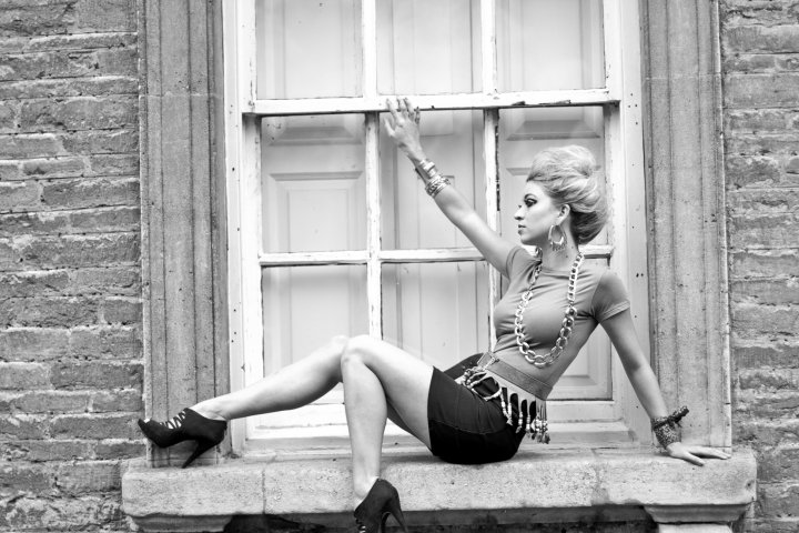 Female model photo shoot of Lisa Duxbury by Tamryn Henn, clothing designed by RedRock Fashion