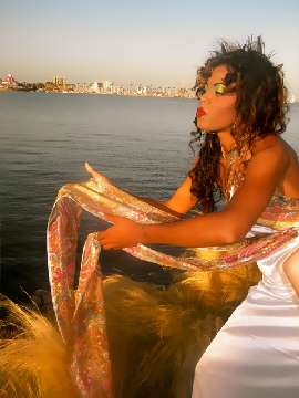 Female model photo shoot of Gynisha Alysh Gilpen in LONG BEACH, CA MAYA WATERFRONT
