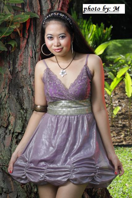 Female model photo shoot of JENKYLE in Singapore Botanical Garden