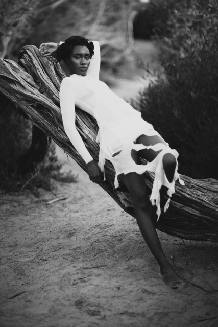 Female model photo shoot of Naomi Kissiedu Green in Black Rock