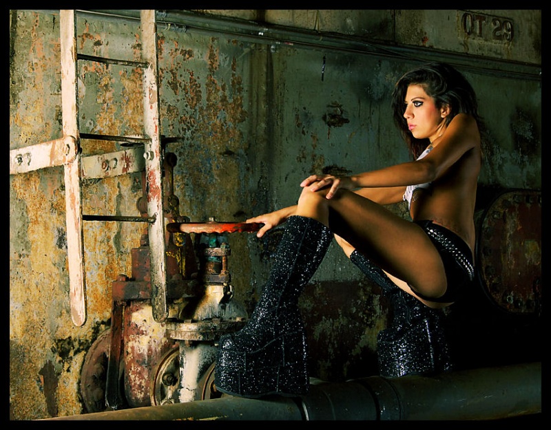 Female model photo shoot of Raichel Robinson in Queen Mary boiler room, Long Beach