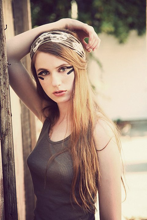 Female model photo shoot of Treja Makeup and Hair