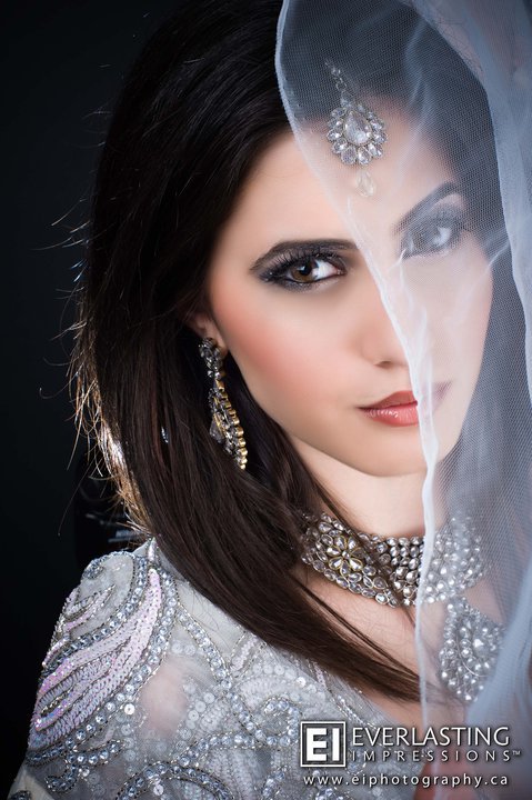 Female model photo shoot of GloriaE in Beauty Zone, makeup by Huma Khan