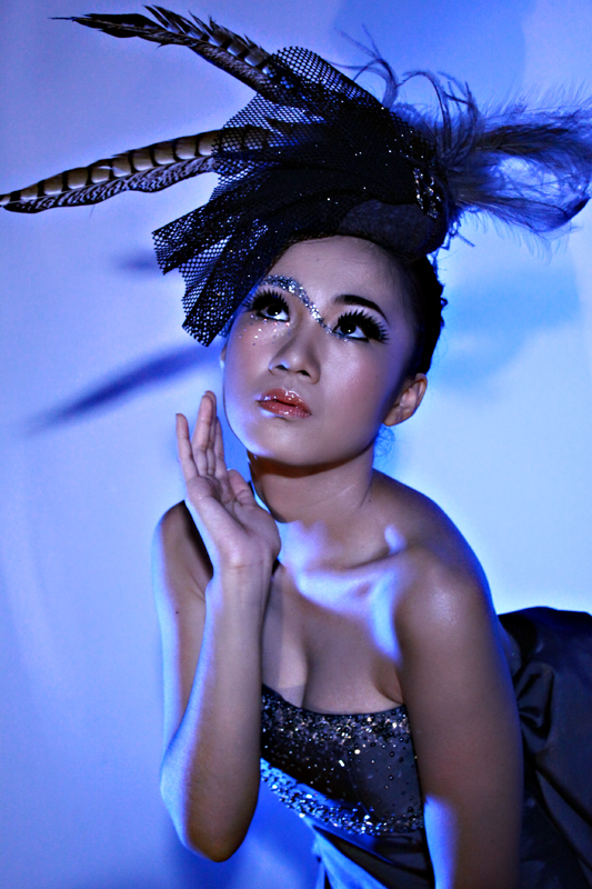 Female model photo shoot of Putri Kansil by NDRU LB