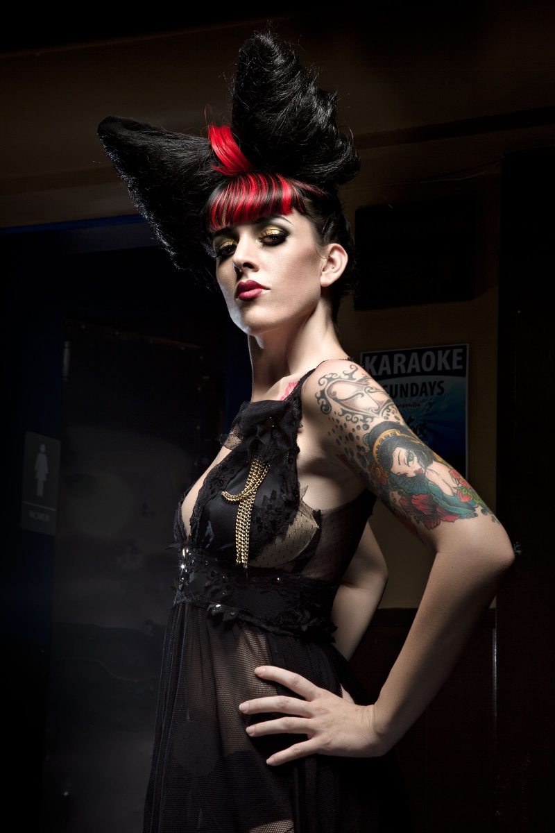 Female model photo shoot of siobhan clothing by cody conrad in Optimist Club/ Hotel Congress, makeup by Tony Kougar