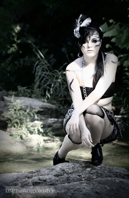 Female model photo shoot of Eris by ii_Photography in Austin Texas, hair styled by Sarah Paduano, makeup by iiCakeFace