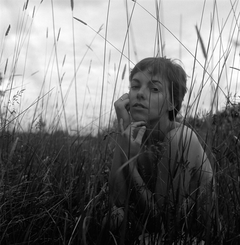 Female model photo shoot of Allie Vokalo by Alexis_Kennedy in Portland, in the tall, tall grass.