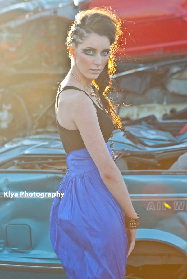 Female model photo shoot of Kiya Photography, clothing designed by poutclothing