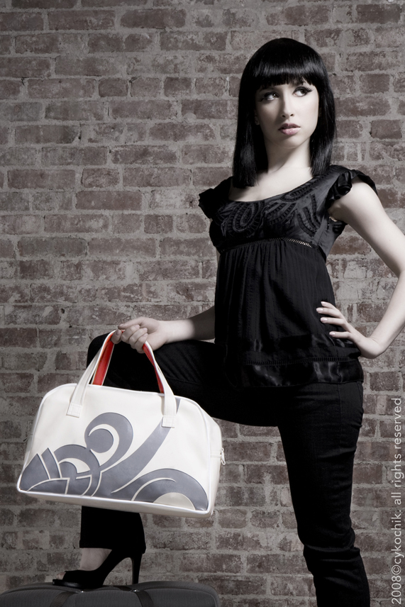 Female model photo shoot of Cykochik Handbags in NYC