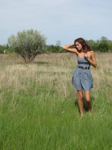 Female model photo shoot of Katelyn Klein in Backyard in neighbors field