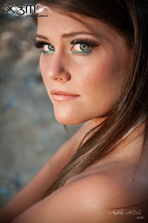 Female model photo shoot of Bombshell Makeup 