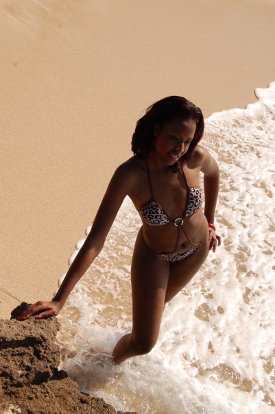 Female model photo shoot of Khatanah  in Galeon Bay Beach Antigua. W.I.
