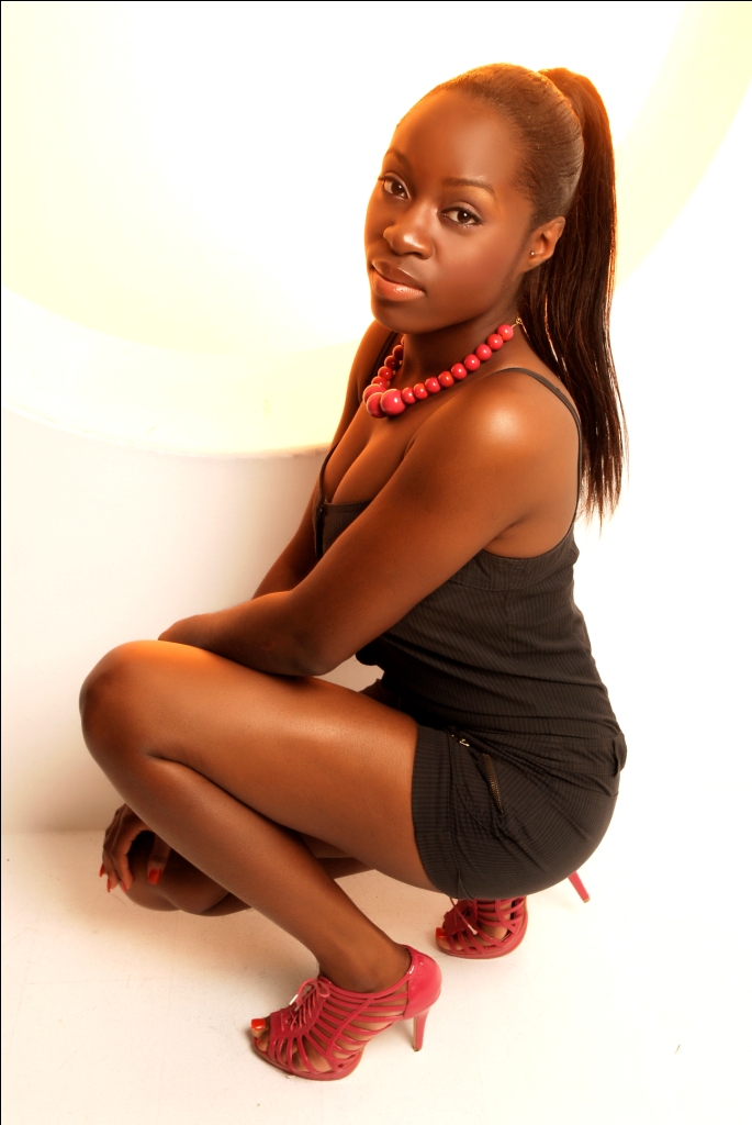 Female model photo shoot of Akosia Agyemang