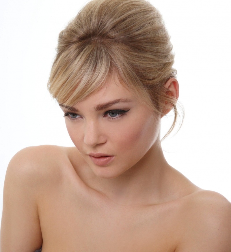 Female model photo shoot of Cara hair and make up 