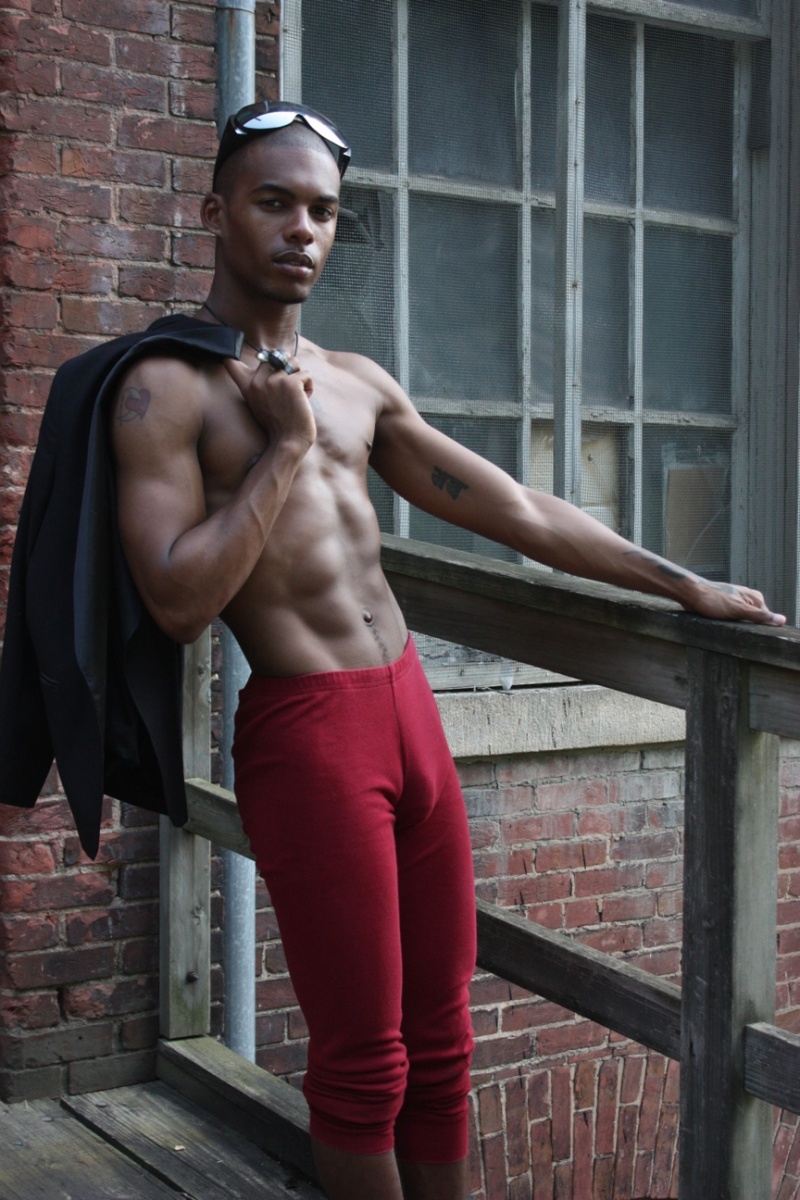 Male model photo shoot of CeJai Designs in Abandoned building in Bmore