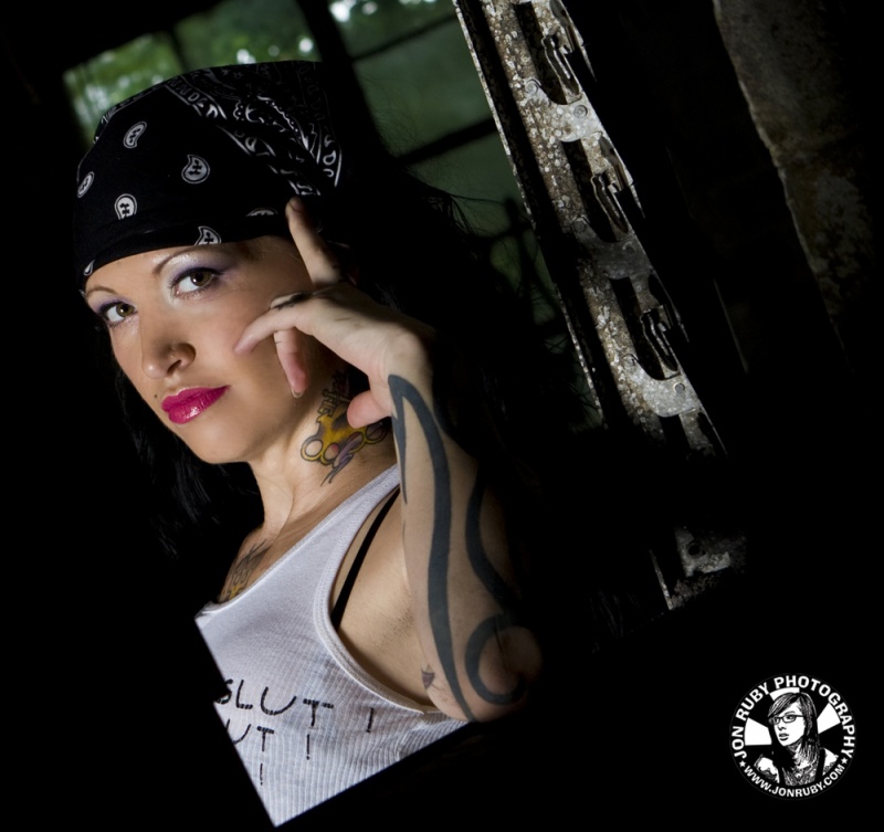 Female model photo shoot of Tattedpandora by Jon Ruby in Downtown Atlanta  empty warehouse, makeup by Trisha Stowell