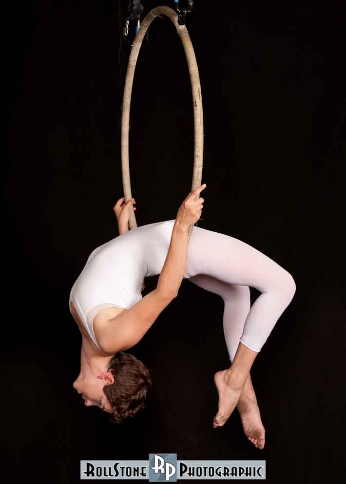 Female model photo shoot of Esh Aerial Arts by RollStone Photographic in Flying Squirrel Consortium