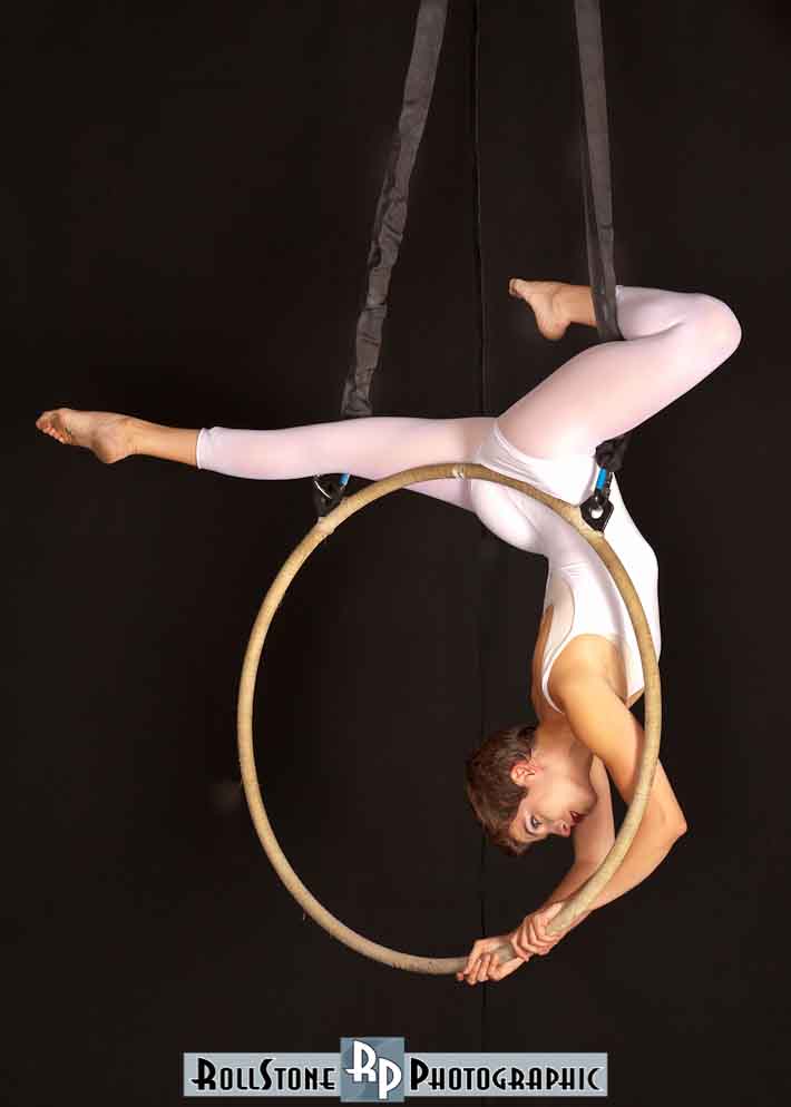 Female model photo shoot of Esh Aerial Arts by RollStone Photographic in Flying Squirrel Consortium