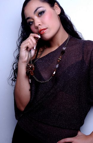 Female model photo shoot of Glam Lola MUA