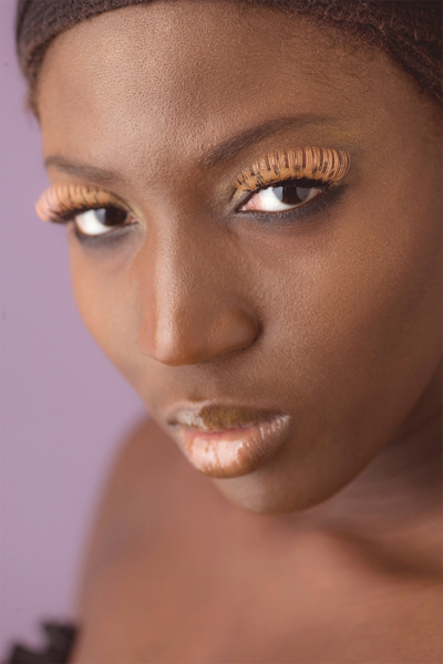 Female model photo shoot of Juliet Onyeka by Aubs Photos in London, makeup by Juliet Onyeka