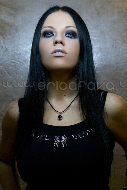 Female model photo shoot of perla make up