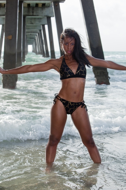 Female model photo shoot of Nneka N by CLK Photography in Dania Beach Pier, FL