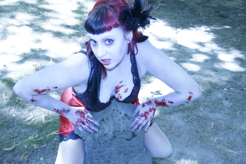 Female model photo shoot of Lil Red Bettie by Chazz Gold Photography in Lone Fir Cemetery