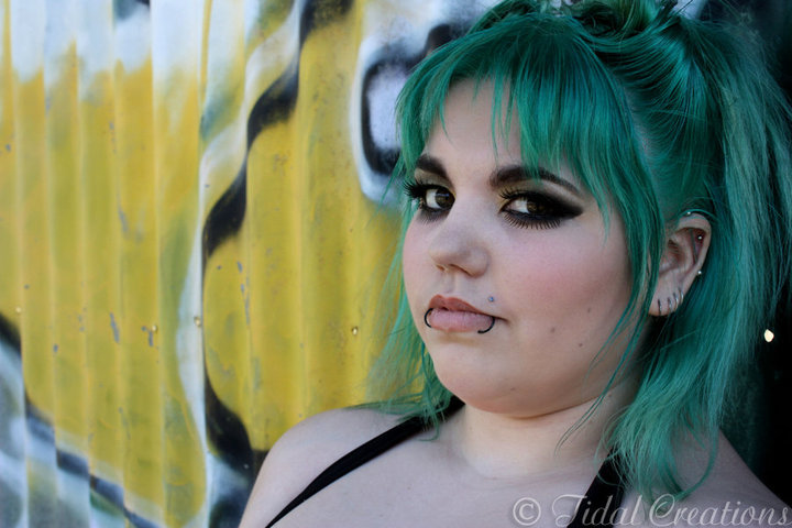 Female model photo shoot of Katt Menace by Tidal Creations in Kingston, makeup by Persefoni Tide MUA