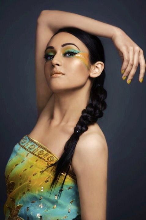 Female model photo shoot of Ria Makeup Artist