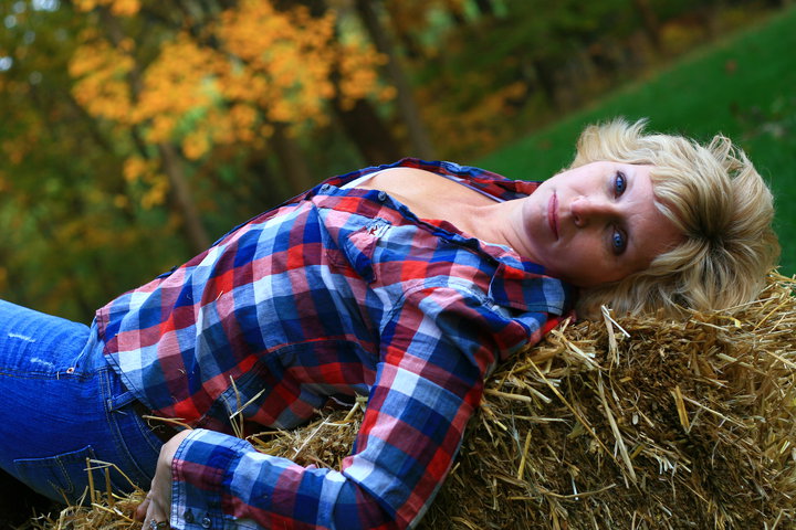 Female model photo shoot of Deborah Captures in Fall Shoot at Iron Bridge.