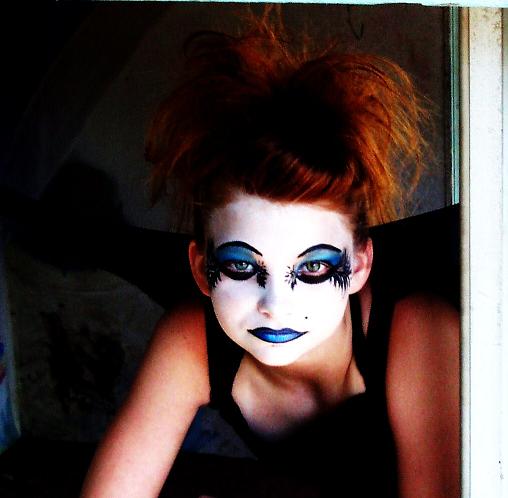 Female model photo shoot of Smoak N Kreations, hair styled by Smoak N Kreations