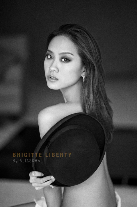 Female model photo shoot of Brigette Liberty Yu in The loft.