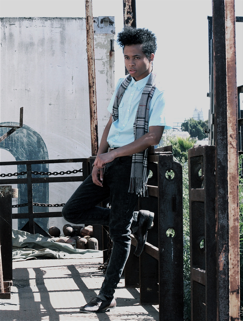 Male model photo shoot of Maxilliano Scipio in abandoned industrial