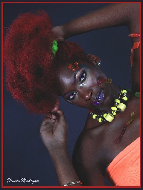 Female model photo shoot of Donnica by Dennis Madigan, hair styled by Uzuri Designs, makeup by TBG Makeup Artistry