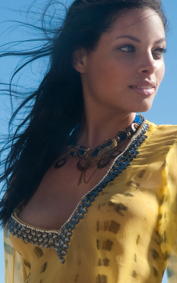 Female model photo shoot of YevArts Jewelry by Olga Lacosta