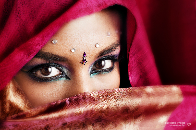 Female model photo shoot of Janaki Vishvakarman by Anthony Byron, makeup by Cathy Mason
