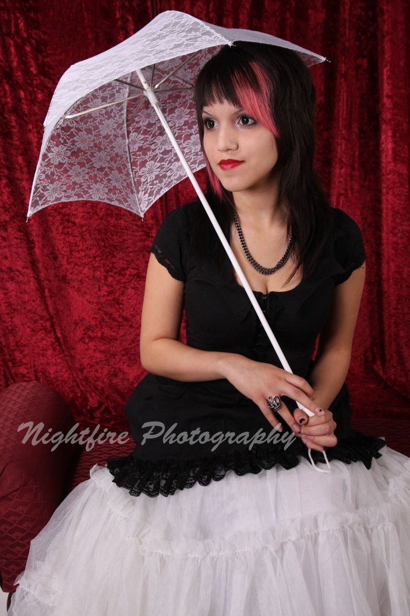 Female model photo shoot of Nightfire Photography and Audriana Z in Covenant Studios